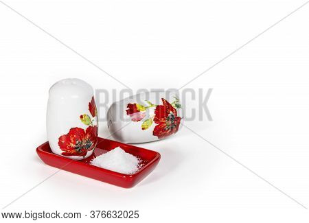 Salt And Pepper Shakers On A White Background