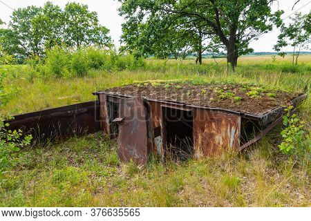 Remains Of An Old, Wrecked, Abandoned Ship That Was Buried In The Ground.