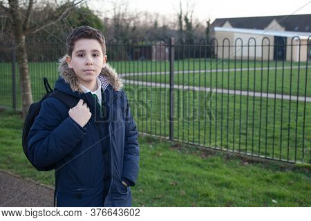 A School Boy Photographed Outside His School, Taken In Witney, Oxfordshire On February The 6th 2020.