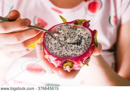 Woman Is The Tropical Fruit Of Pitaya. Exotic Fruits For A Healthy Diet. Red Dragon Fruit. Vegetaria