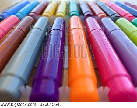 A Set Of Colorful Felt-tip Pens For Drawing In A Plastic Box Perspective Close-up View.