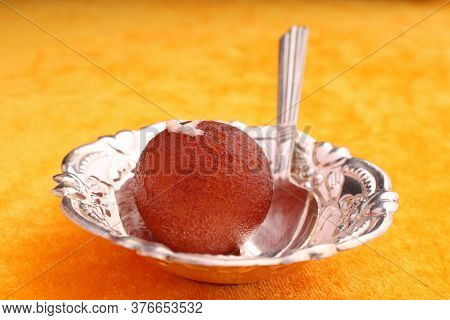 Indian Dessert Gulabjamun Fried Balls Socked In Sugar Syrup