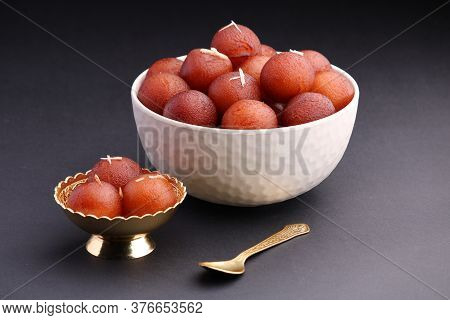 Indian Dessert Gulabjamun Fried Balls Socked In Sugar Syrup