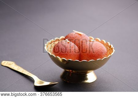 Indian Dessert Gulabjamun Fried Balls Socked In Sugar Syrup
