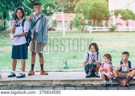 Kanchanaburi,thailand-july 2,2020:unidentified Elementary School Students Wear Face Mask To Prevent 