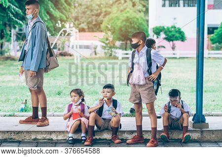Kanchanaburi,thailand-july 2,2020:unidentified Elementary School Students Wear Face Mask To Prevent 