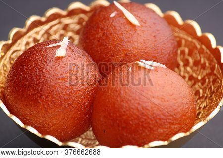Indian Dessert Gulabjamun Fried Sweet Balls Socked In Sugar Syrup