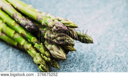 Asparagus. Fresh Green Asparagus On A Gray Slate Background, Copy Space Top View
