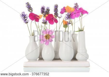 Colorful flower bouquet from the garden in vases