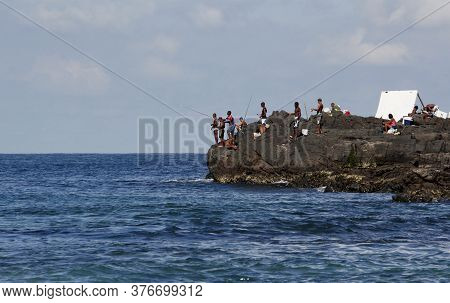 Salvador, Bahia / Brazil - April 14, 2013: Fishermen Are Seen In Pieces On Barra Beach In The City O