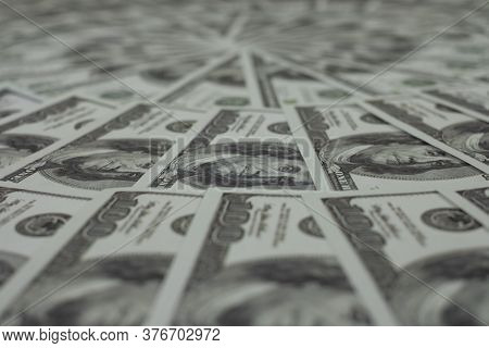 Group Of Money Stack Of 100 Us Dollars Banknotes A Lot Of Is Arranged In A Beautiful, Selective Focu