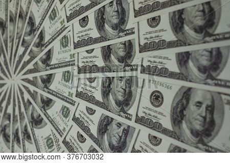 Group Of Money Stack Of 100 Us Dollars Banknotes A Lot Of Is Arranged In A Beautiful, Selective Focu