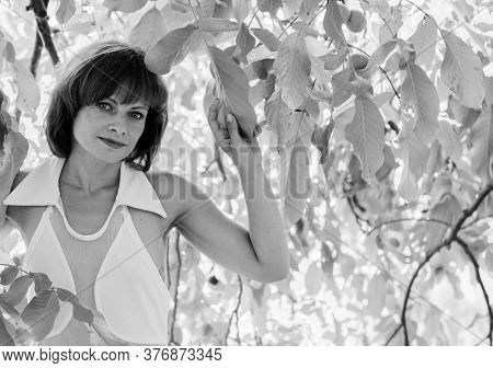 Miniature Mature Woman Resting On Nature And Enjoying Weekend. The Concept Of Harmony With Life And 