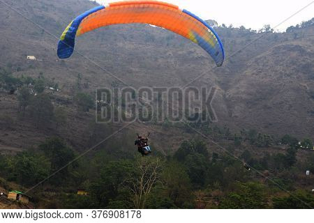 Naukuchia Taal, Nanital, Uttarakhand, India, 31 May, 2018:   A Glider Glidding In The Mountains Of H