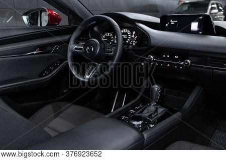 Novosibirsk/ Russia - April 28 2020: Mazda 3, Salon Of A New Stylish Car, Steering Wheel , Dashboard