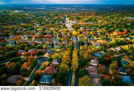 Colorful Rooftops And Fall Landscape Aerial Drone Views Above Thousands Of Homes And Houses In Subur