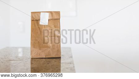 Delivery Home Food App Concept Image With Paper Bag. Space For Text Or Logo.