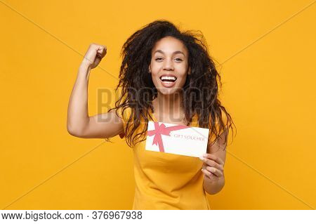Laughing Young African American Woman Girl In Casual T-shirt Posing Isolated On Yellow Orange Wall B