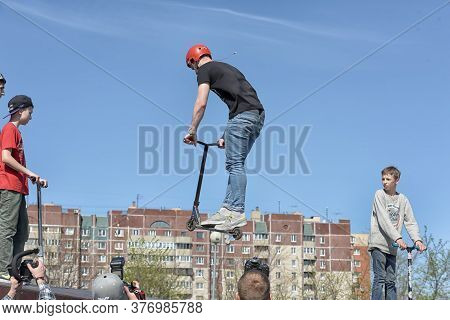 Russia, St. Petersburg, 10,05,2015.boy On Scooter Flips In The Air, The Youth Festival Of Extreme Sp