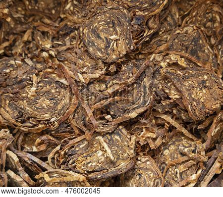 Full Frame Closeup Shot Of Rolled Pipe Tobacco Flakes