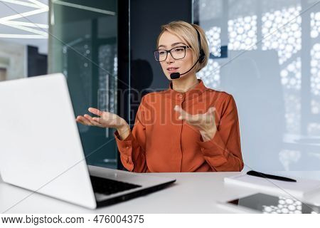 Businesswoman With Video Call Headset Talking To Customers Remotely, Female Worker Smiling And Advis
