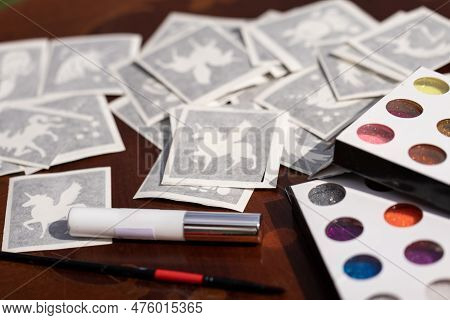 All The Material Ready On The Table For Making Shimmering Sparkling Glitter Tattoo For Children At A