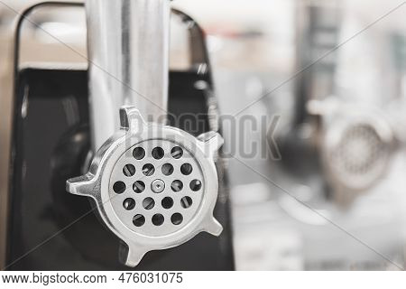 Meat Grinder Close-up In The Store Against The Background Of Other Meat Grinders
