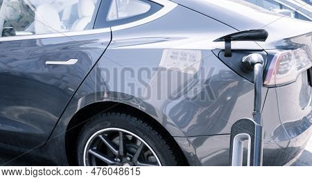 Charging Station For Electric Cars. Types And Connectors Of Ports For Charging Vehicles.