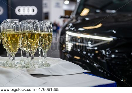Riga, Latvia, April 28, 2023: Closeup Of A Champagne Glass At The Premiere Of The Audi Q8 E-tron At 