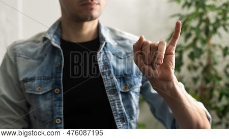 Sign Language Interpreter Man Translating A Meeting To Asl, American Sign Language. Empty Copy Space