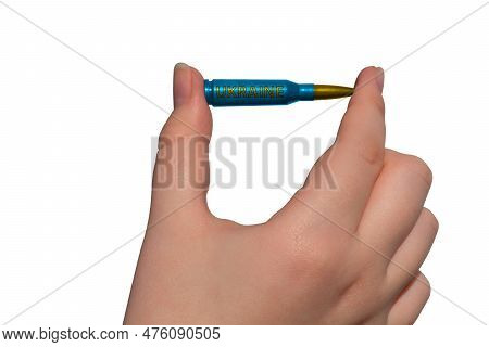 Yellow-blue Rifle Cartridge With The Inscription Ukraine In A Hand On A Transparent Background. Nati