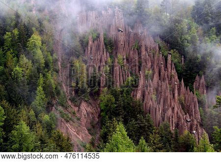 Landscape With The View Of The Earth Pyramids Renon In The Morning Fog Near The City Of Bolzano In T