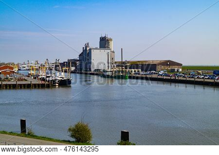 Buesum Is A Village At The German Northern Sea With Harbor And Lighthouse