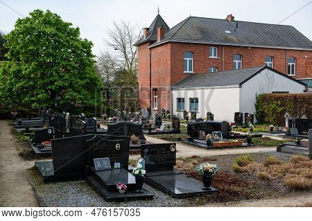 Geel, Antwerp Province, Belgium - April 22, 2023 - Graveyard And Tombs Of The Village