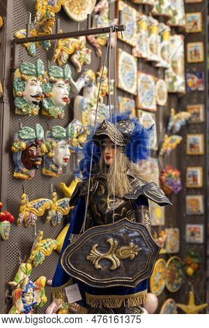 Syracuse, Sicily, Italy - April 29, 2023: A Typical Sicilian Hand Puppet (pupi Siciliani) In A Gift 