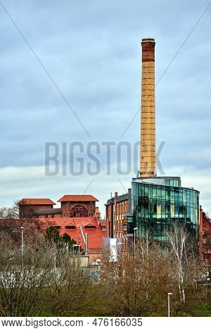 Buildings And Brick Chimney Of A Former Gasworks In The City Of Poznan, Poland