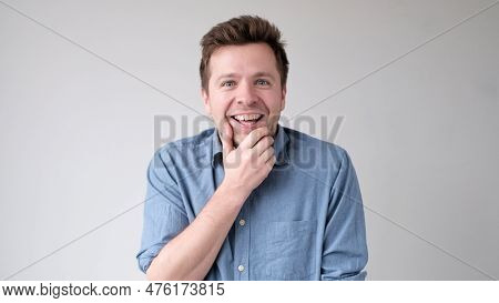 European Funny Young Man Is Laughing Loudly. Positive Emotion