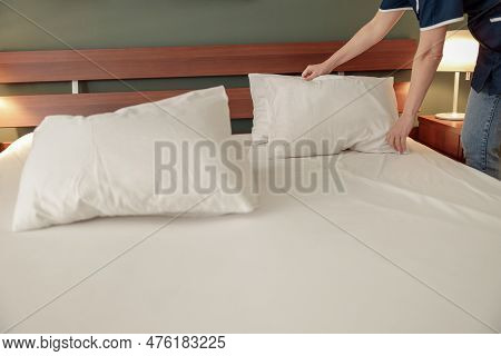Cleaning Lady Doing Housekeeping And Making Bed In Hotel Room. Cleaning Service Concept