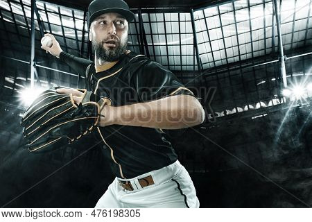 Porfessional Baseball Player With Ball On Grand Arena. Ballplayer On Stadium In Action.