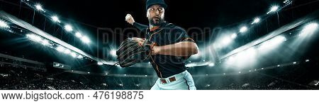 Wide Photo. Porfessional Baseball Player With Ball On Grand Arena. Ballplayer On Stadium In Action.