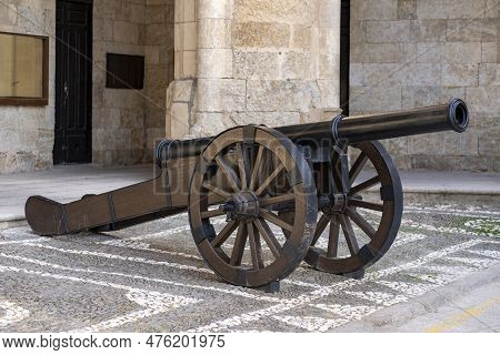 Old Cannon In Front Of The Main Façade Of The Town Hall Of Ciudad Rodrigo In Salamanca, Spain.