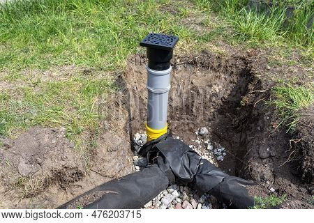Overflow And Infiltration Well Connected To Drainage Pipes, Buried In A Pit Covered With Stones.