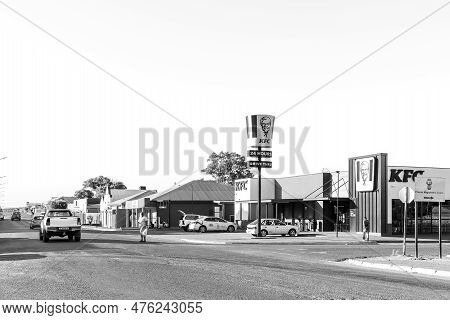 Prieska, South Africa - Feb 28 2023: A Street Scene, With Businesses, People And Vehicles, In Priesk