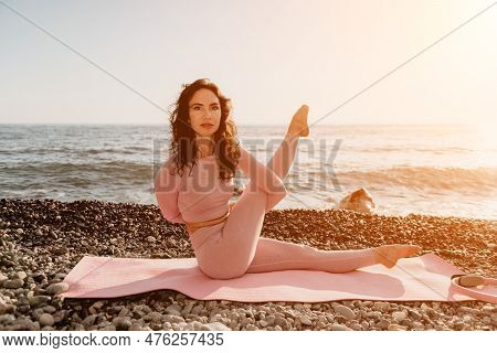 Woman Sea Yoga. Happy Woman With Black Hair Doing Pilates With The Ring On The Yoga Mat Near The Sea