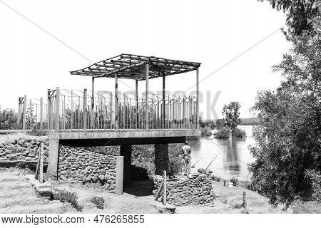 Douglas, South Africa - Mar 1, 2023: Angler At Samevloeiing Near Douglas Where The Orange And Vaal R