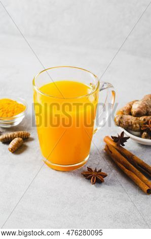Turmeric Tea, Healthy Beverage With Turmeric Root And Spices, Jamu Juice, Immunity Booster Drink On