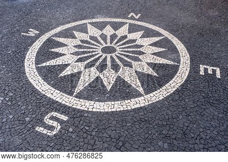 Compass Lined With Paving Stones. Black And White Mosaic Floor From Calcada Tiling In Funchal, Madei