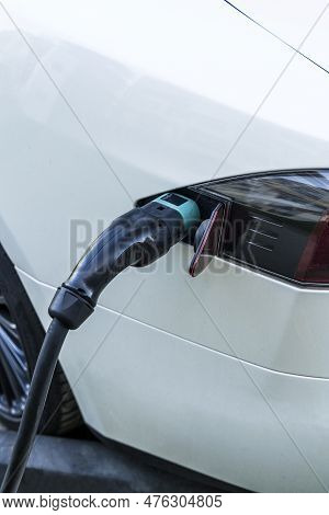 Charging Station For Electric Cars. Types And Connectors Of Ports For Charging Vehicles.