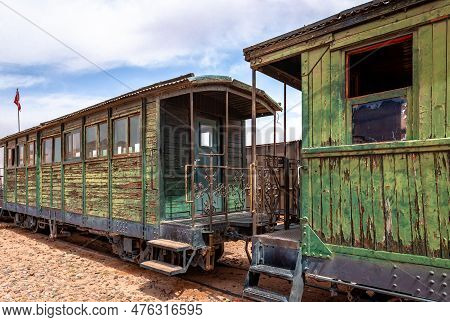 Obsolete Train Wagons From A Bygone Era In Wadi Rum, The Famous Jordanian Desert.