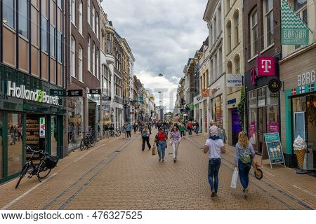 Groningen, The Netherlands - July 7, 2022: People In Shopping Street Herestraat Near Vismarkt And Gr